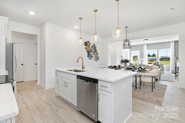 492 Switch St Unit 82Ty, York, SC 29745 - kitchen featuring stainless steel appliances, a sink, light wood-type flooring, white cabinets, and recessed lighting