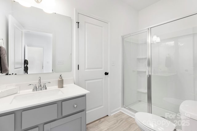 492 Switch St Unit 82Ty, York, SC 29745 - full bathroom featuring toilet, a shower stall, vanity, and wood finished floors