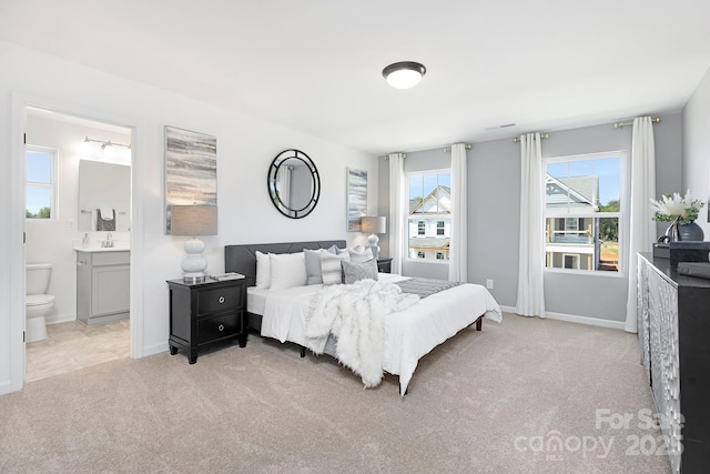 492 Switch St Unit 82Ty, York, SC 29745 - bedroom featuring light carpet, ensuite bathroom, a sink, and baseboards