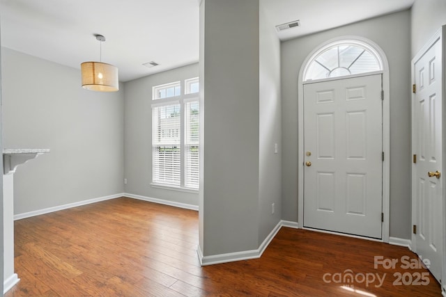 10867 Garden Oaks Ln, Charlotte, NC 28273 - entrance foyer featuring wood finished floors and baseboards