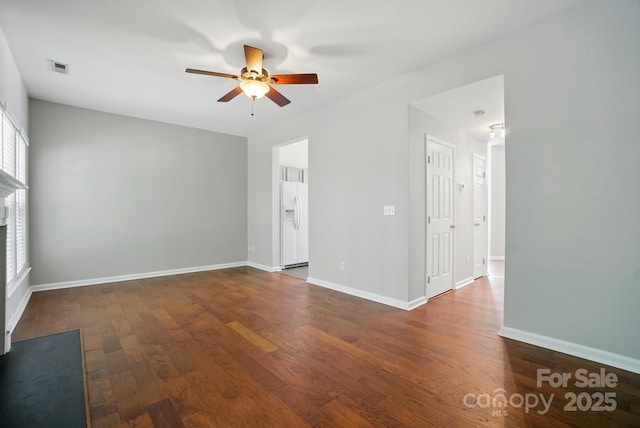 10867 Garden Oaks Ln, Charlotte, NC 28273 - empty room featuring a ceiling fan, wood finished floors, and baseboards