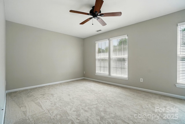 10867 Garden Oaks Ln, Charlotte, NC 28273 - carpeted spare room with baseboards, plenty of natural light, and ceiling fan