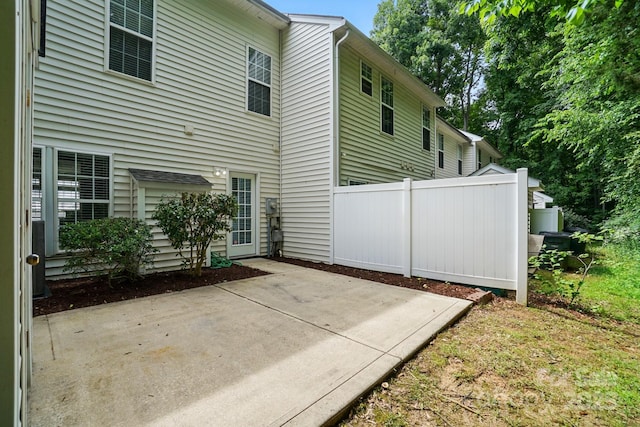 10867 Garden Oaks Ln, Charlotte, NC 28273 - back of property featuring a patio