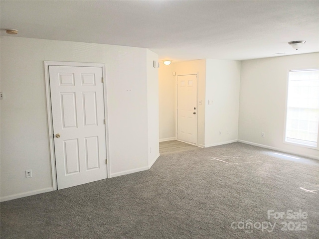 1911 Flushing Ct, Charlotte, NC 28215 - empty room with carpet and baseboards