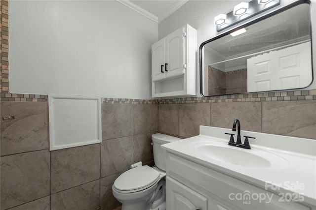 2011 Hampton Heights St, Lenoir, NC 28645 - full bathroom featuring tile walls, tiled shower, toilet, crown molding, and vanity