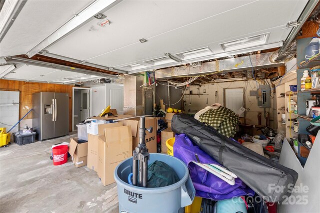 2011 Hampton Heights St, Lenoir, NC 28645 - garage featuring stainless steel refrigerator with ice dispenser and electric panel