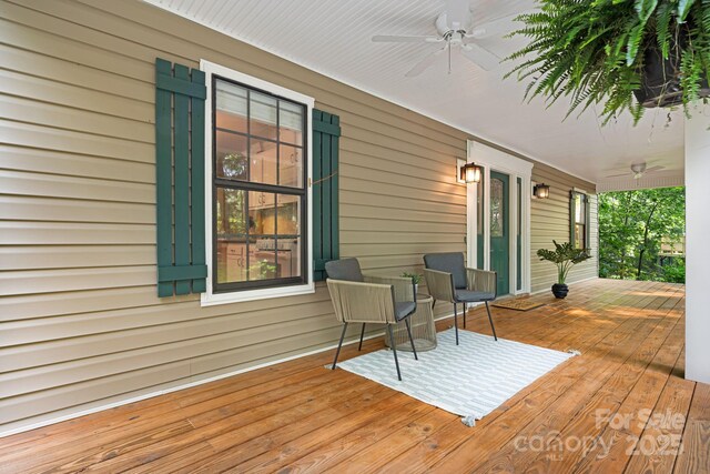 212 Riva Ridge Dr, Fairview, NC 28730 - wooden porch featuring a ceiling fan