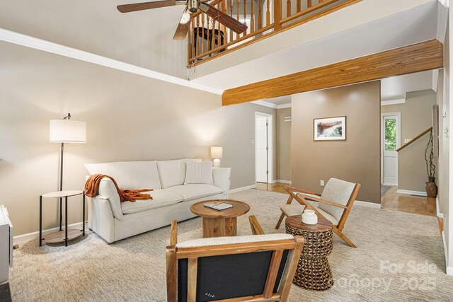 212 Riva Ridge Dr, Fairview, NC 28730 - carpeted living area with a ceiling fan, baseboards, ornamental molding, and a towering ceiling