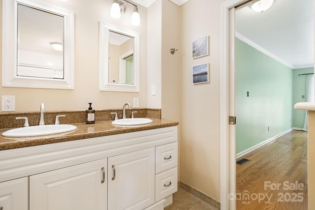 212 Riva Ridge Dr, Fairview, NC 28730 - bathroom featuring ornamental molding, double vanity, and baseboards