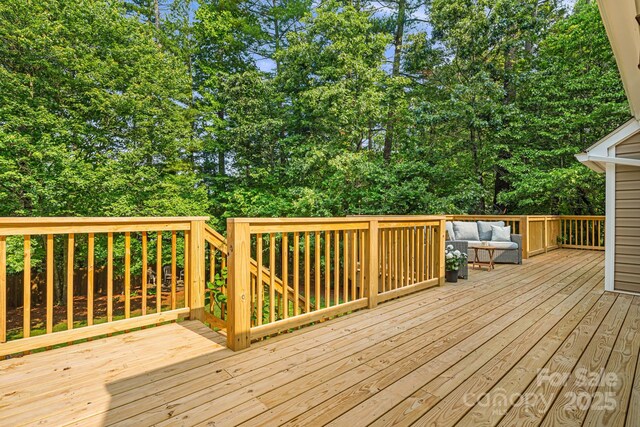 212 Riva Ridge Dr, Fairview, NC 28730 - wooden deck with an outdoor hangout area