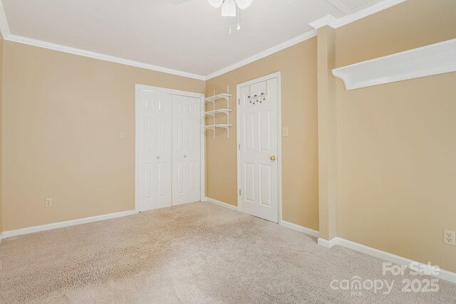 212 Riva Ridge Dr, Fairview, NC 28730 - unfurnished bedroom with carpet floors, ornamental molding, a closet, baseboards, and ceiling fan