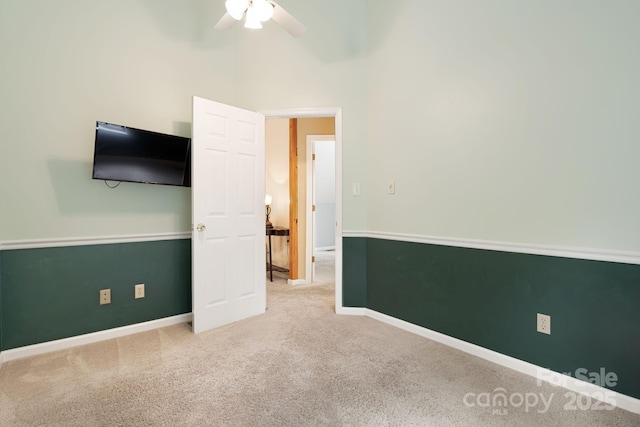 212 Riva Ridge Dr, Fairview, NC 28730 - unfurnished bedroom featuring carpet flooring, baseboards, and ceiling fan