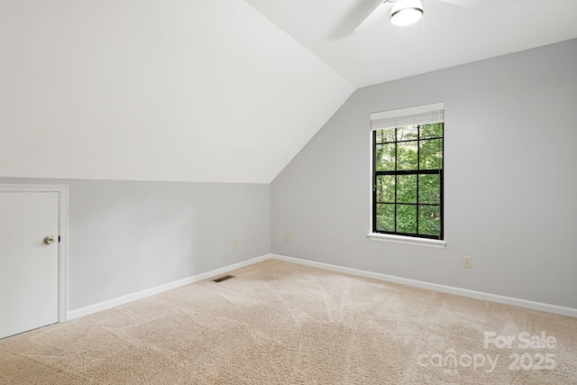 212 Riva Ridge Dr, Fairview, NC 28730 - additional living space featuring carpet flooring, lofted ceiling, a ceiling fan, and baseboards