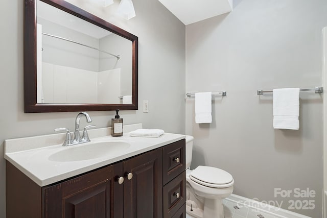 212 Riva Ridge Dr, Fairview, NC 28730 - bathroom with toilet, vanity, a shower, baseboards, and tile patterned floors
