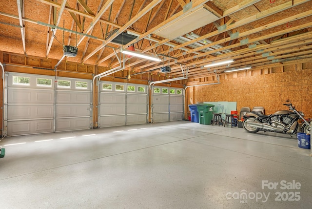 212 Riva Ridge Dr, Fairview, NC 28730 - garage featuring a garage door opener