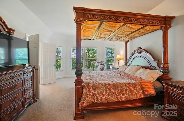 129 N Audubon Ave, Mooresville, NC 28117 - carpeted bedroom featuring lofted ceiling