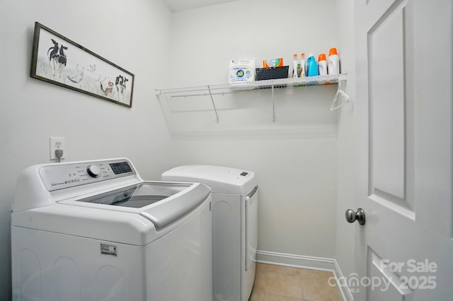 129 N Audubon Ave, Mooresville, NC 28117 - laundry area with washing machine and dryer and light tile patterned floors