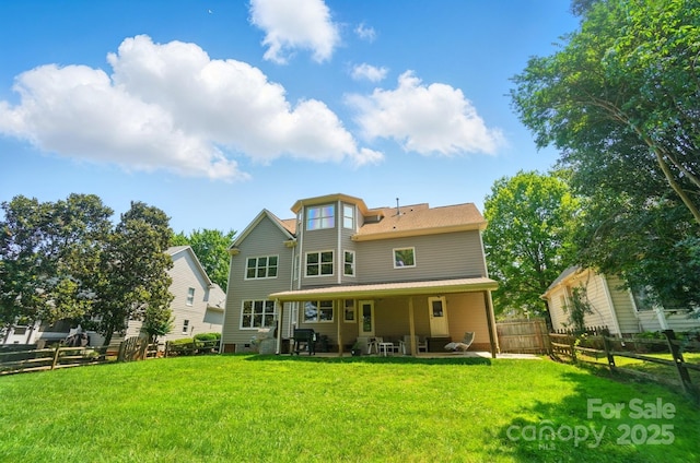 129 N Audubon Ave, Mooresville, NC 28117 - back of property featuring a patio