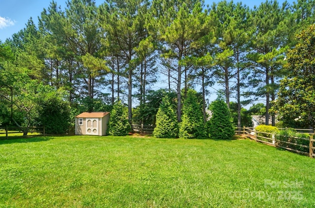 129 N Audubon Ave, Mooresville, NC 28117 - fenced backyard with a storage shed