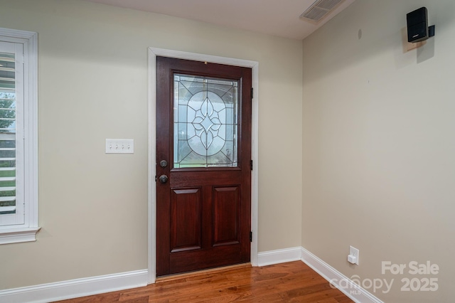 2817 Long Cir Unit 1, Iron Station, NC 28080 - entrance foyer featuring wood finished floors and baseboards