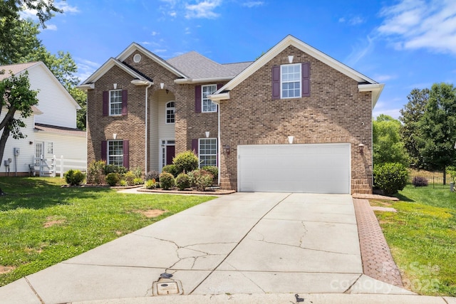 4764 Brockton Ct NW, Concord, NC 28027 - view of front of house with brick siding, a garage, driveway, and a front lawn