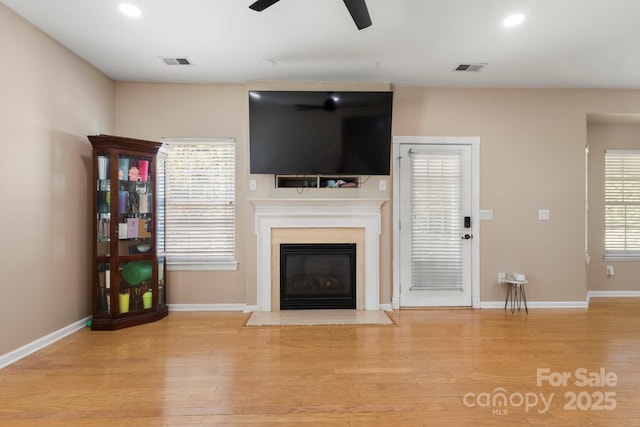 4764 Brockton Ct NW, Concord, NC 28027 - unfurnished living room with ceiling fan, wood finished floors, a fireplace with flush hearth, baseboards, and recessed lighting