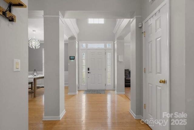 4764 Brockton Ct NW, Concord, NC 28027 - entryway with light wood-style flooring, baseboards, and ornamental molding