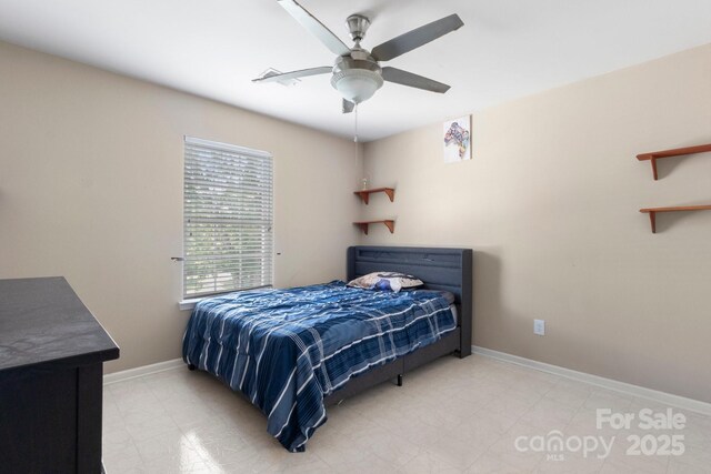 4764 Brockton Ct NW, Concord, NC 28027 - bedroom featuring baseboards and a ceiling fan