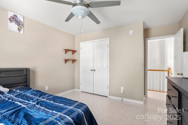 4764 Brockton Ct NW, Concord, NC 28027 - bedroom featuring a closet, baseboards, a ceiling fan, and light tile patterned floors