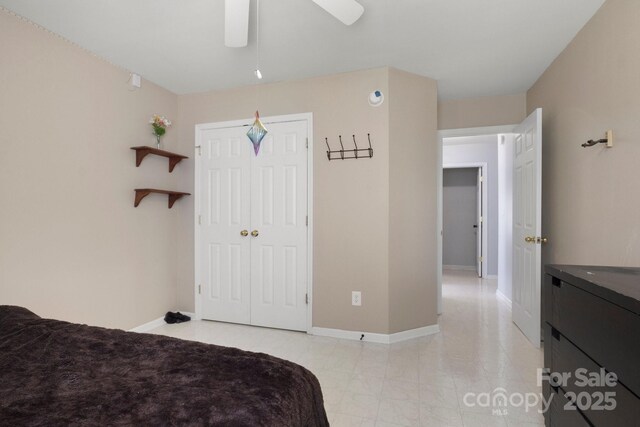 4764 Brockton Ct NW, Concord, NC 28027 - bedroom with a closet, baseboards, and a ceiling fan