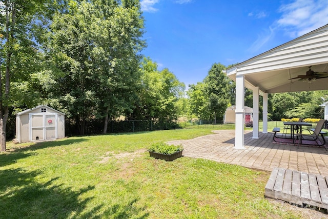 4764 Brockton Ct NW, Concord, NC 28027 - view of yard featuring a ceiling fan, a patio area, and view of wooded area