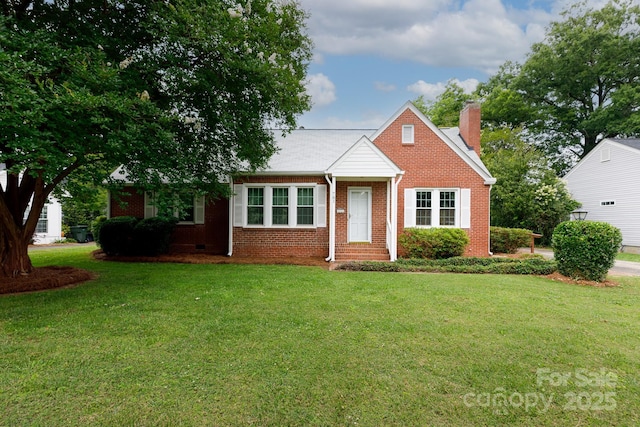 761 Milton Ave, Rock Hill, SC 29730 - bungalow-style home featuring brick siding, a chimney, a front yard, and entry steps