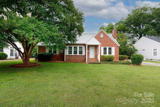 761 Milton Ave, Rock Hill, SC 29730 - view of front of home with brick siding, a front yard, and a chimney