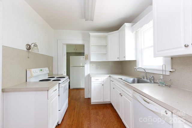 761 Milton Ave, Rock Hill, SC 29730 - kitchen with white appliances, a sink, open shelves, wood finished floors, and decorative backsplash