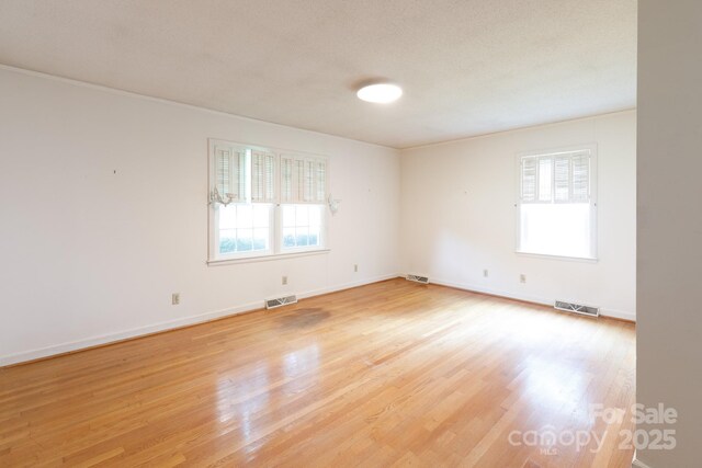 761 Milton Ave, Rock Hill, SC 29730 - unfurnished room with light wood-type flooring and baseboards