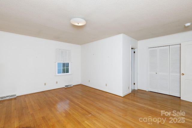 761 Milton Ave, Rock Hill, SC 29730 - unfurnished bedroom featuring light wood finished floors and baseboards