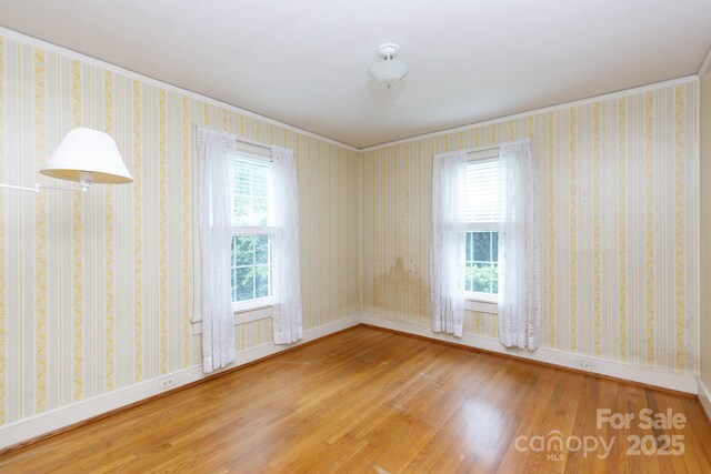 761 Milton Ave, Rock Hill, SC 29730 - unfurnished room with wood finished floors, baseboards, and crown molding