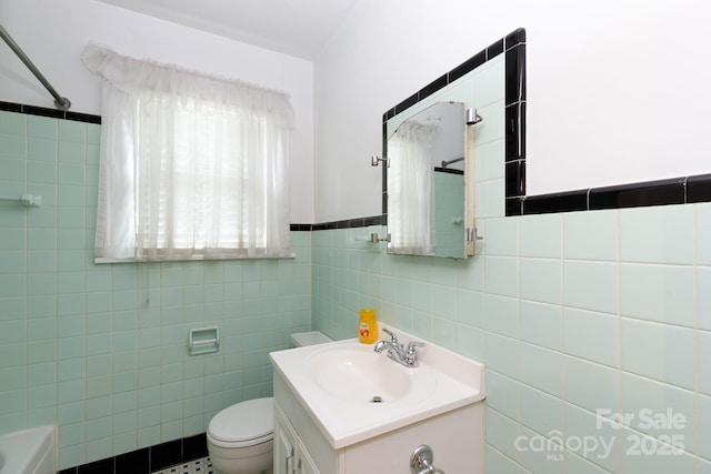 761 Milton Ave, Rock Hill, SC 29730 - bathroom with tile walls, vanity, and toilet