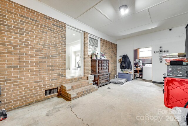 739 Springdale Rd, Rock Hill, SC 29730 - interior space with brick wall and washer / clothes dryer