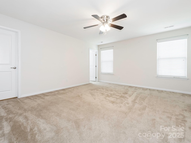 709 Volta Dr NW, Concord, NC 28027 - carpeted empty room featuring baseboards and a ceiling fan
