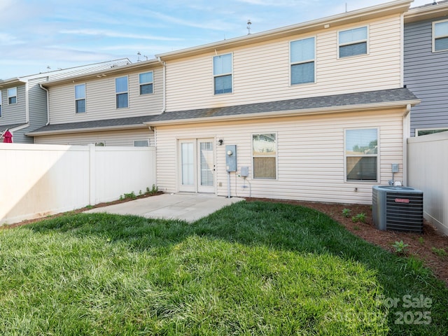709 Volta Dr NW, Concord, NC 28027 - back of house with central air condition unit and a patio