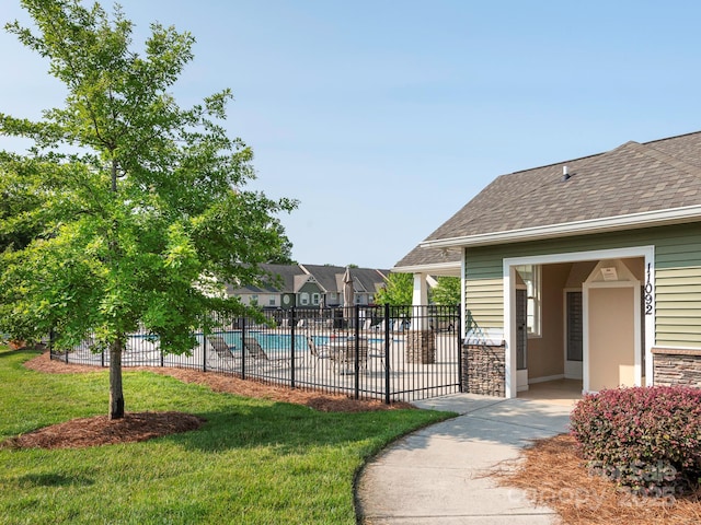 709 Volta Dr NW, Concord, NC 28027 - community pool featuring a patio