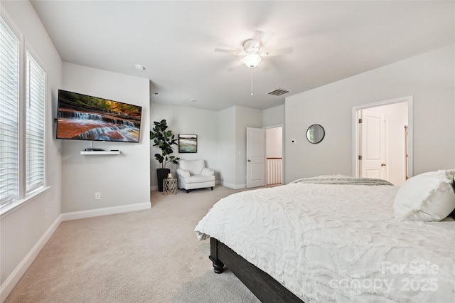 10022 Wayfair Meadow Ct, Charlotte, NC 28277 - bedroom with light colored carpet, baseboards, and a ceiling fan