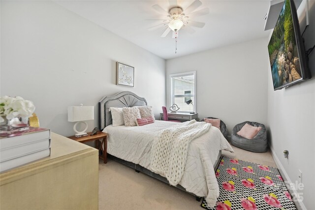 10022 Wayfair Meadow Ct, Charlotte, NC 28277 - bedroom with light colored carpet, a ceiling fan, and baseboards