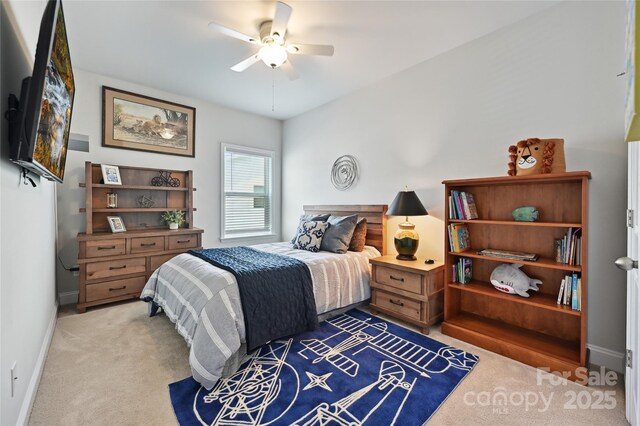 10022 Wayfair Meadow Ct, Charlotte, NC 28277 - bedroom featuring light colored carpet, baseboards, and a ceiling fan