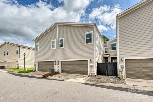 10022 Wayfair Meadow Ct, Charlotte, NC 28277 - view of front of property featuring an attached garage and central AC