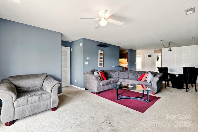 1134 Plaza Walk Dr, Charlotte, NC 28215 - carpeted living area with a ceiling fan and baseboards