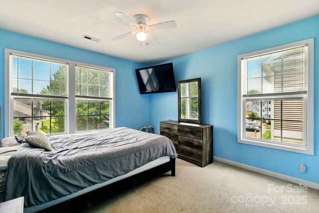 1134 Plaza Walk Dr, Charlotte, NC 28215 - carpeted bedroom featuring baseboards and ceiling fan