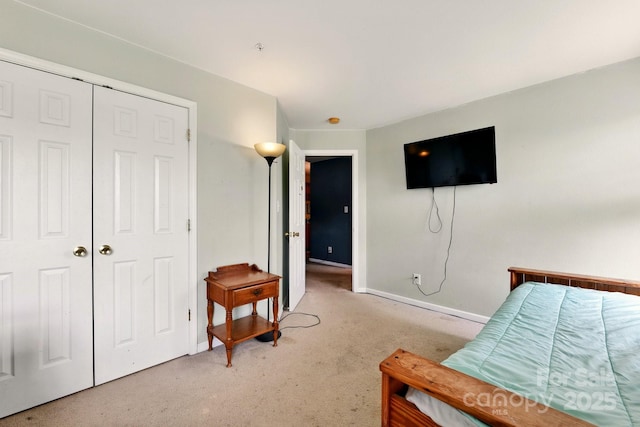 1134 Plaza Walk Dr, Charlotte, NC 28215 - bedroom featuring carpet flooring, baseboards, and a closet
