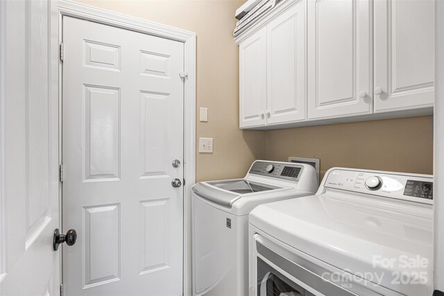 12312 Mcallister Park Dr, Charlotte, NC 28277 - laundry room featuring independent washer and dryer and cabinet space